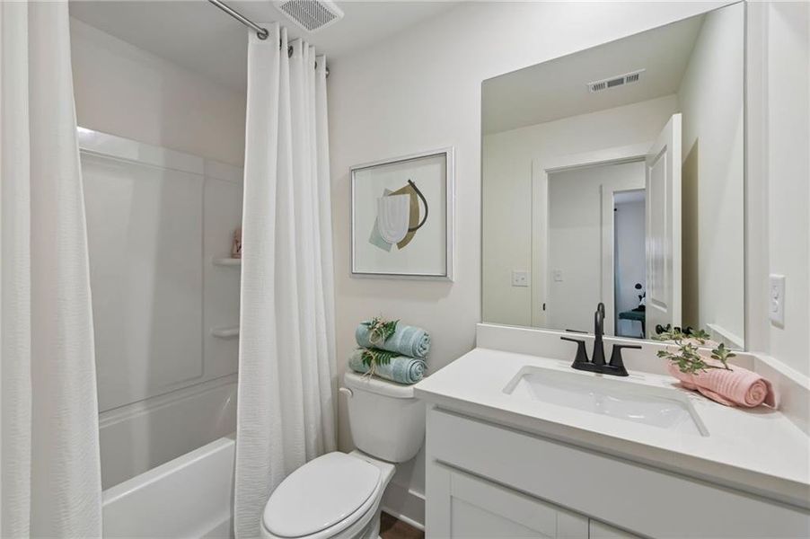 Furnished interior view inside a new home in Tribute, Hoschton (Image 30).
