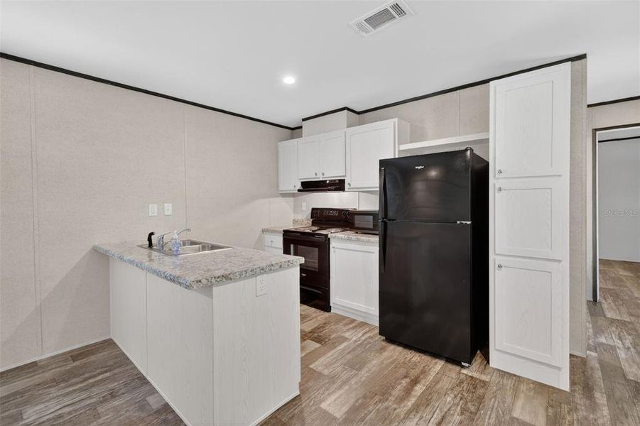 Furnished interior view inside a new home in , Bushnell (Image 4).