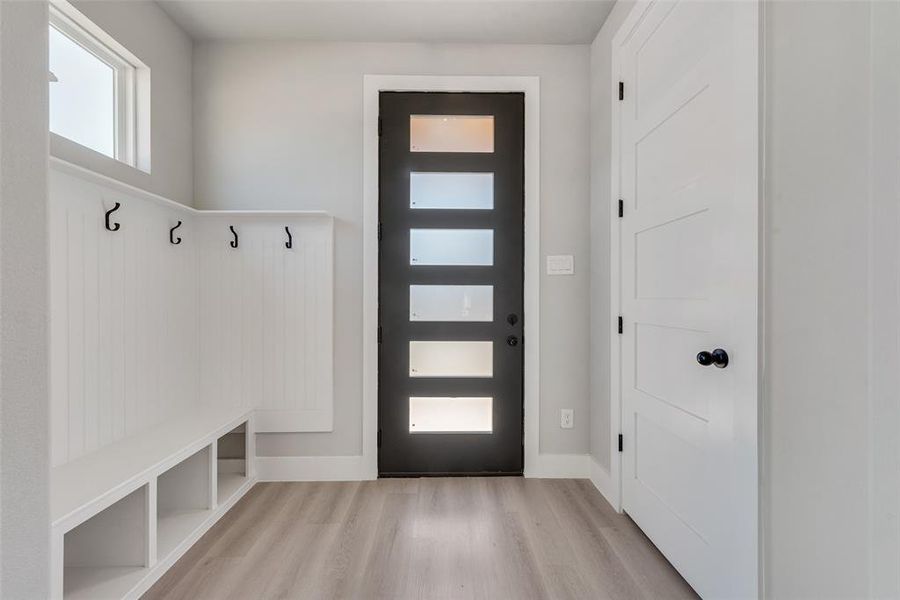 Mudroom featuring light hardwood / wood-style floors