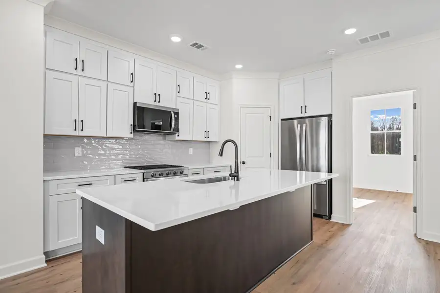 Furnished interior view inside a new home in The Village at River Green, Canton (Image 3).