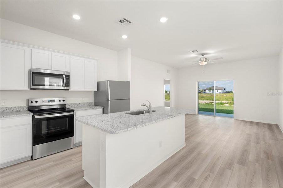 Furnished interior view inside a new home in Gum Lake Preserve, Lake Alfred (Image 3).