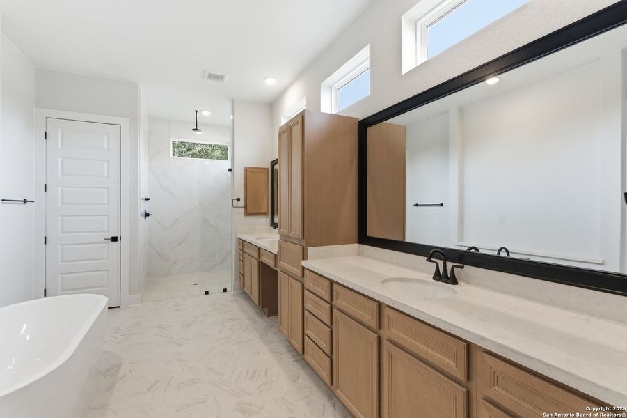 Furnished interior view inside a new home in Potranco Oaks, Castroville (Image 13).