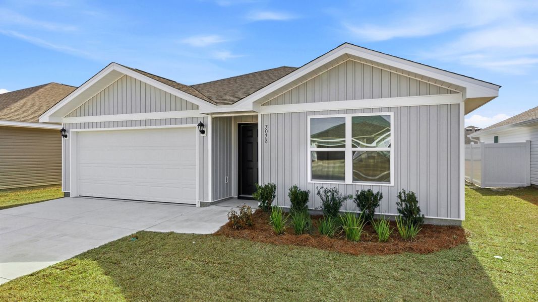 Front exterior of a new home in Liberty, Panama City, FL, highlighting curb appeal (Image 19).