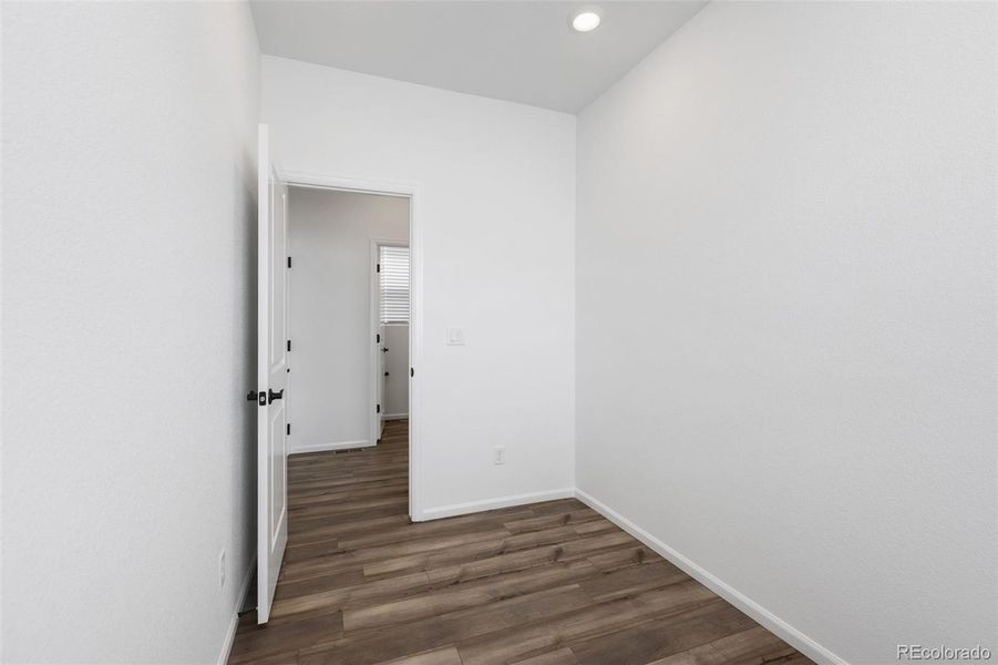 Spacious, unfurnished interior of a new home in Woodrose at Painted Prairie, Aurora (Image 16).