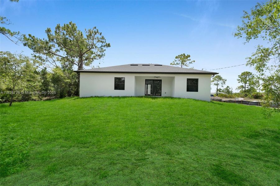 Exterior details and patio area of a home in , Lehigh Acres (Image 12).
