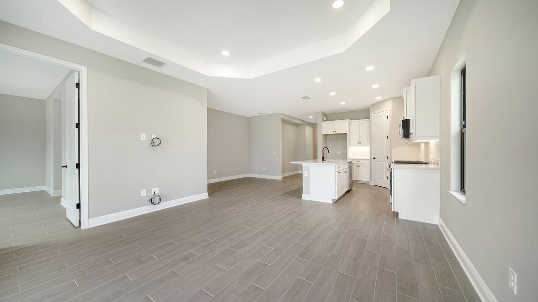 Spacious, unfurnished interior of a new home in Vicenza Real Estate and Homes for Sale in North Venice, FL - Neal Communities, Venice (Image 24).