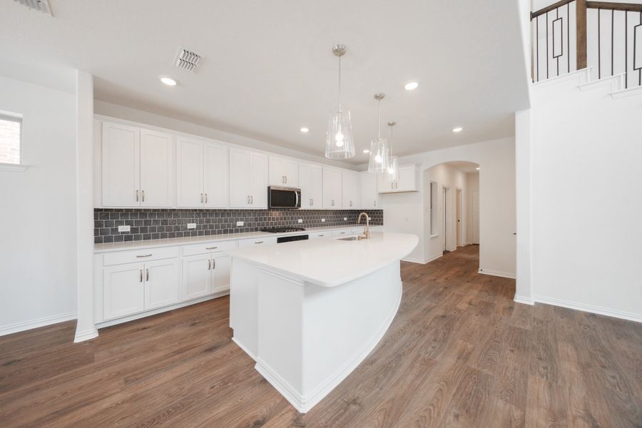 Furnished interior view inside a new home in Wildflower Ranch, Justin (Image 4).