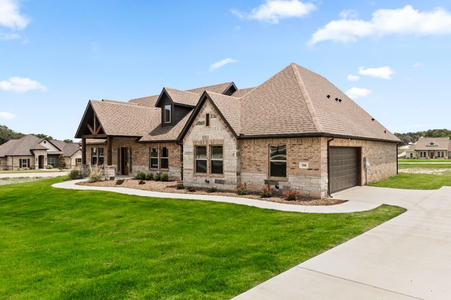 Representative exterior photo of a completed home built from the The Wilder by Doug Parr Custom Homes in Monarch Manor, Poolville, TX (Image 19).