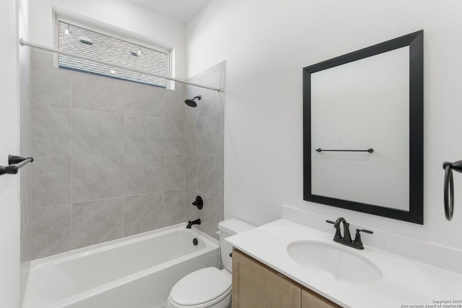 Furnished interior view inside a new home in The Crossvine – Garden Homes, Schertz (Image 6).