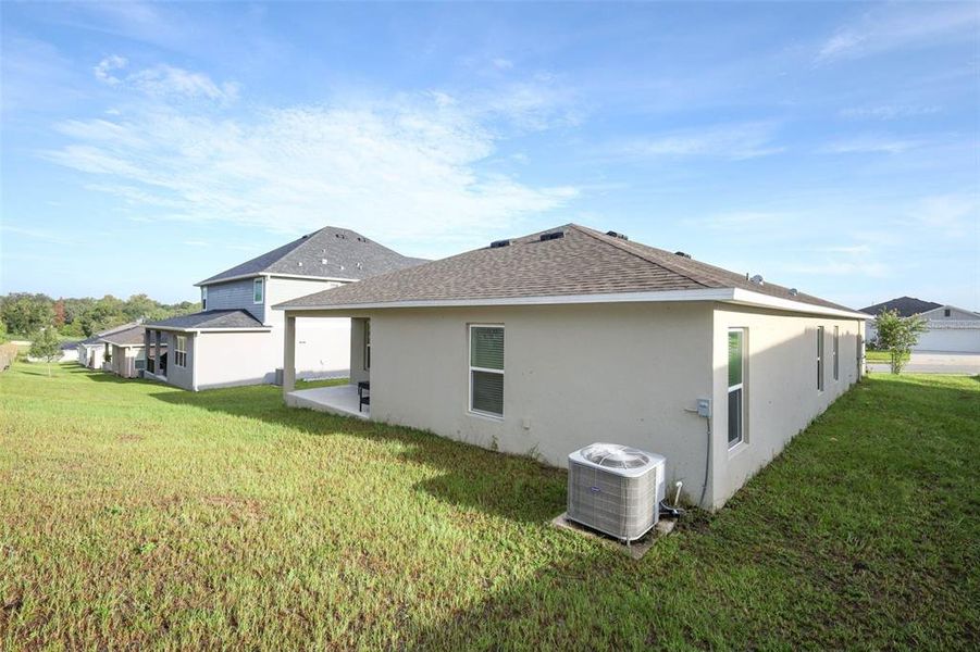 Exterior details and patio area of a home in The Reserve at Lake Ridge II, Minneola (Image 21).