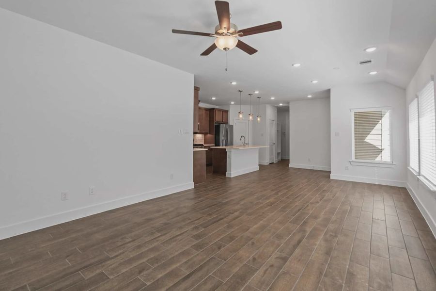 Representative unfurnished interior of a home built from the Carriagehouse by Chesmar Homes in Meridiana Townhomes, Iowa Colony (Image 69).