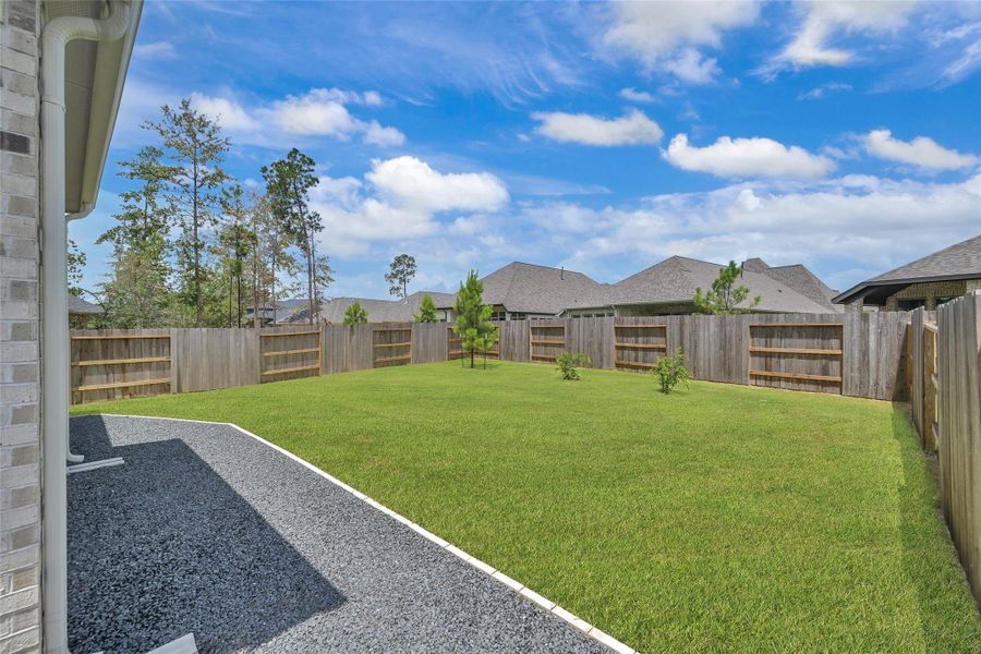 Exterior details and patio area of a home in Evergreen, Conroe (Image 23). Exterior details and patio area of a home in Evergreen, Conroe (Image 23).
