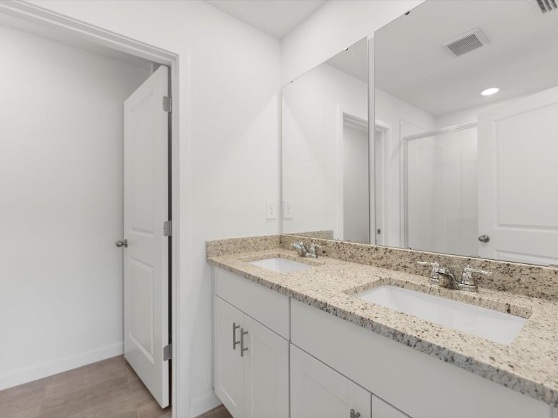 Furnished interior view inside a new home in Flagler Village - Classic Series, Palm Coast (Image 8). Furnished interior view inside a new home in Flagler Village - Classic Series, Palm Coast (Image 8).