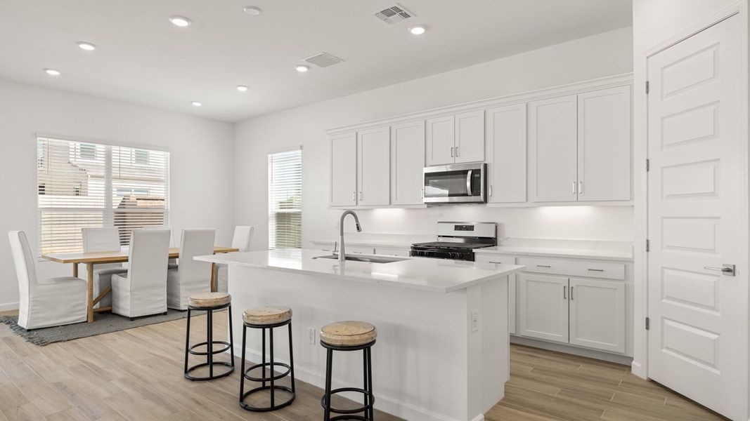 Representative furnished interior of a home built from the Crow by D.R. Horton in Apache Farms, Buckeye (Image 6).