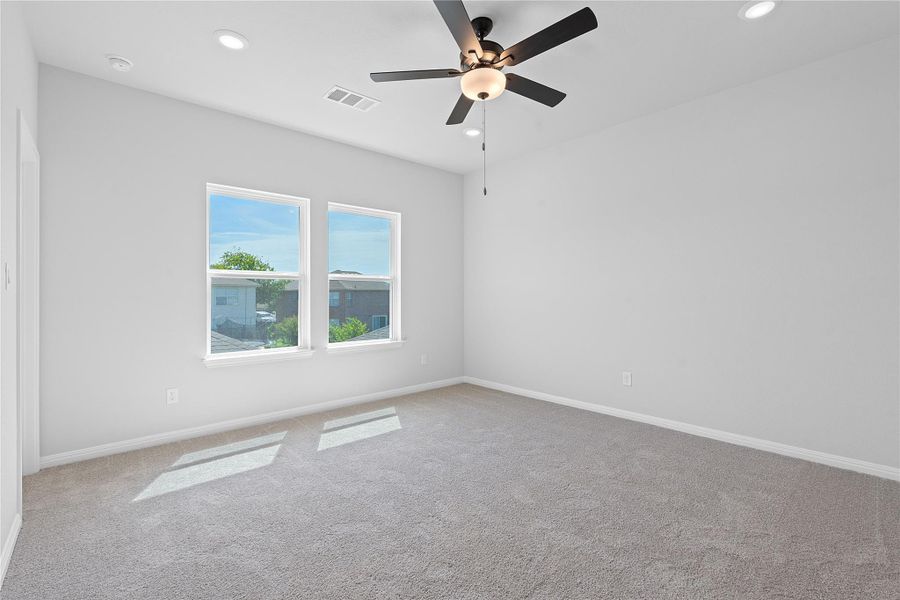 Unfurnished room featuring carpet floors, a ceiling fan, and recessed lighting