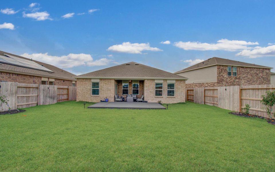Exterior details and patio area of a home in Sunterra, Katy (Image 23). Exterior details and patio area of a home in Sunterra, Katy (Image 23).