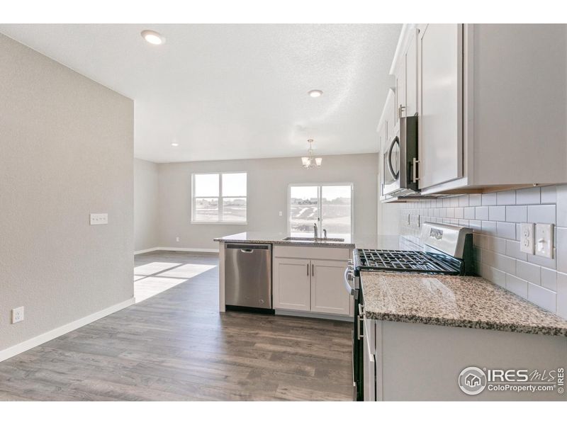 Furnished interior view inside a new home in Silver Peaks, Lochbuie (Image 7).