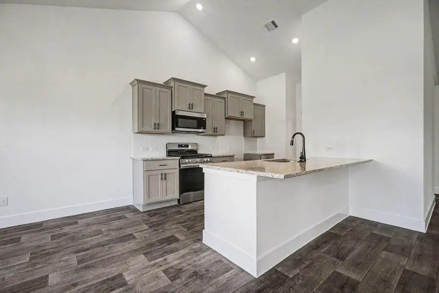 Furnished interior view inside a new home in , Angleton (Image 6).