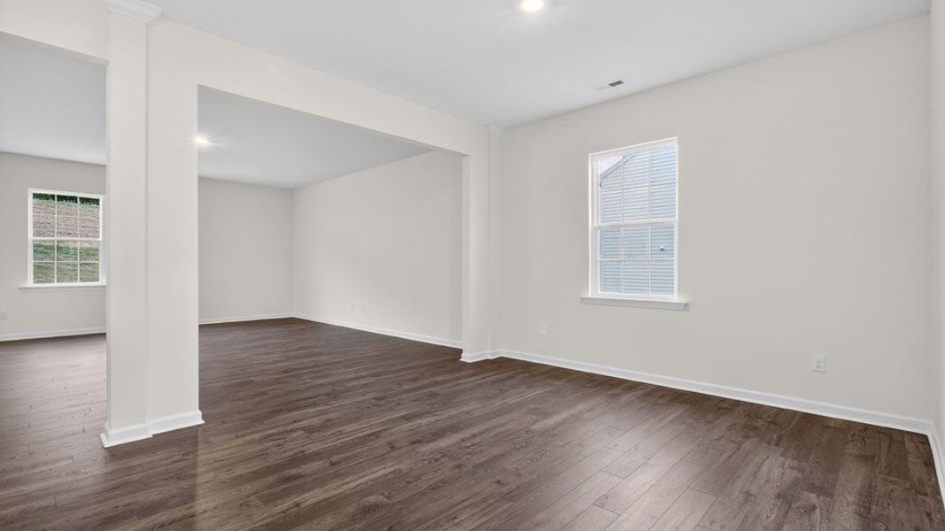 Spacious, unfurnished interior of a new home in Gretchen Pines, West End (Image 15).