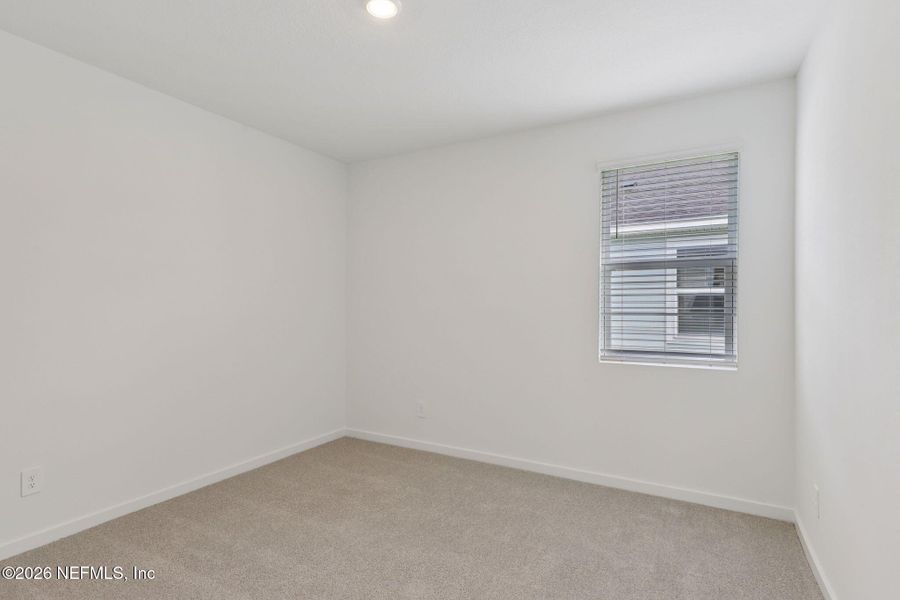 Spacious, unfurnished interior of a new home in Colbert Landings, Palm Coast (Image 19).