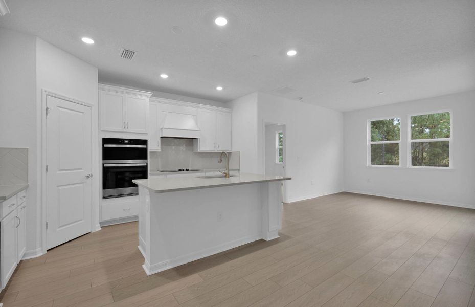 Furnished interior view inside a new home in Hyland Trail, Green Cove Springs (Image 5).