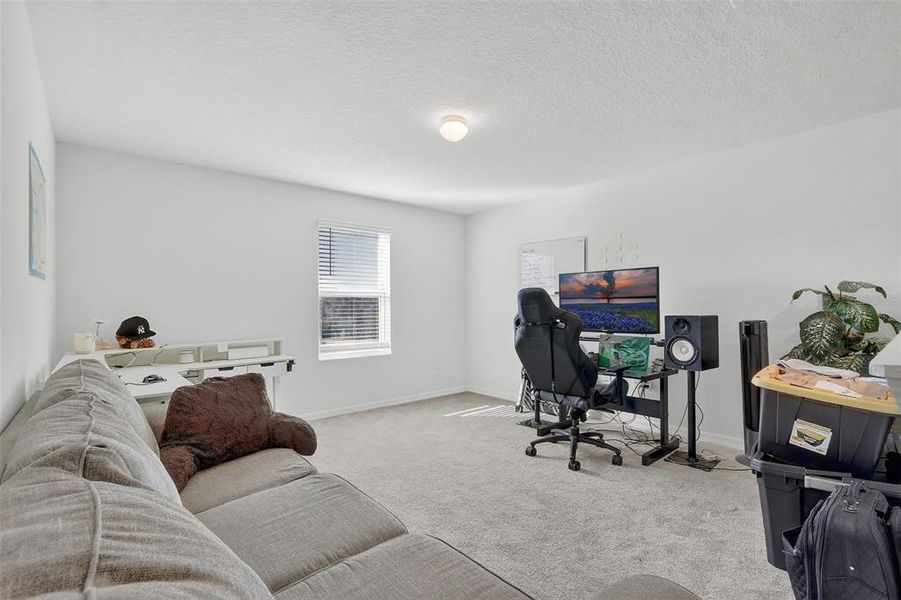 Furnished interior view inside a new home in The Reserve at Lake Ridge, Minneola (Image 39).