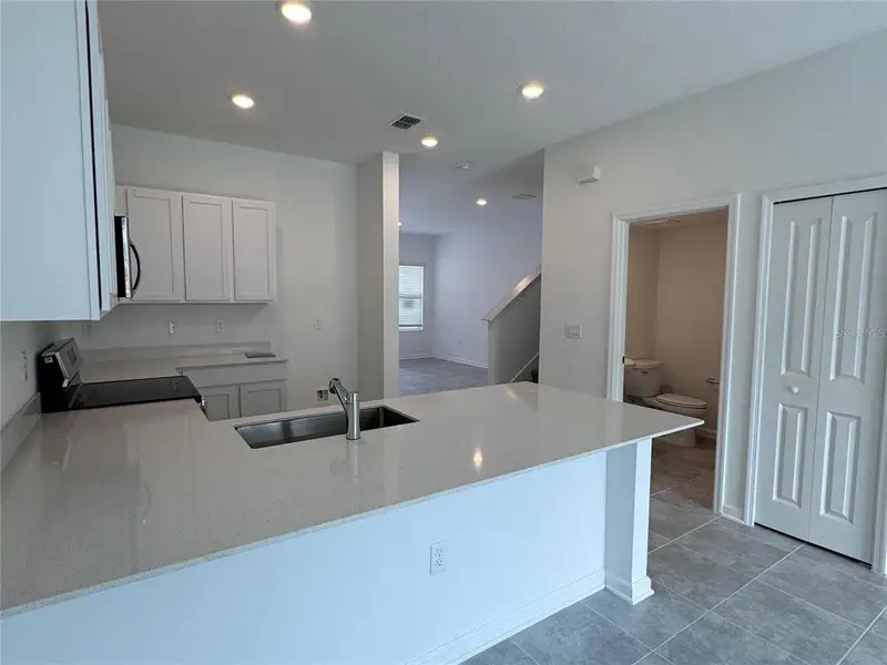 Furnished interior view inside a new home in , Kissimmee (Image 5).