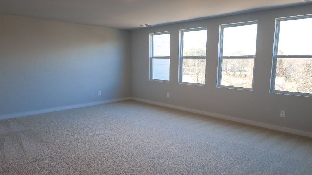 Representative unfurnished interior of a home built from the TISDALE by D.R. Horton in Harvest Point, Spring Hill (Image 57).