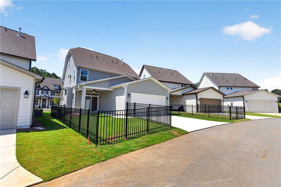 Front exterior of a new home in Marble Tree, Ball Ground, GA, highlighting curb appeal (Image 21).