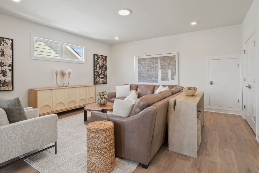 Furnished interior in a model home at Promenade at Sawnee Village in Cumming (Image 22).