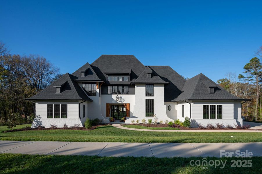 Front exterior of a new home in , Marvin, NC, highlighting curb appeal (Image 19). Front exterior of a new home in , Marvin, NC, highlighting curb appeal (Image 19).