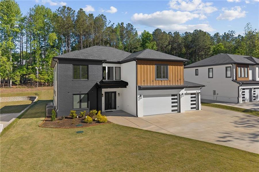 Front exterior of a new home in , Sugar Hill, GA, highlighting curb appeal (Image 26).