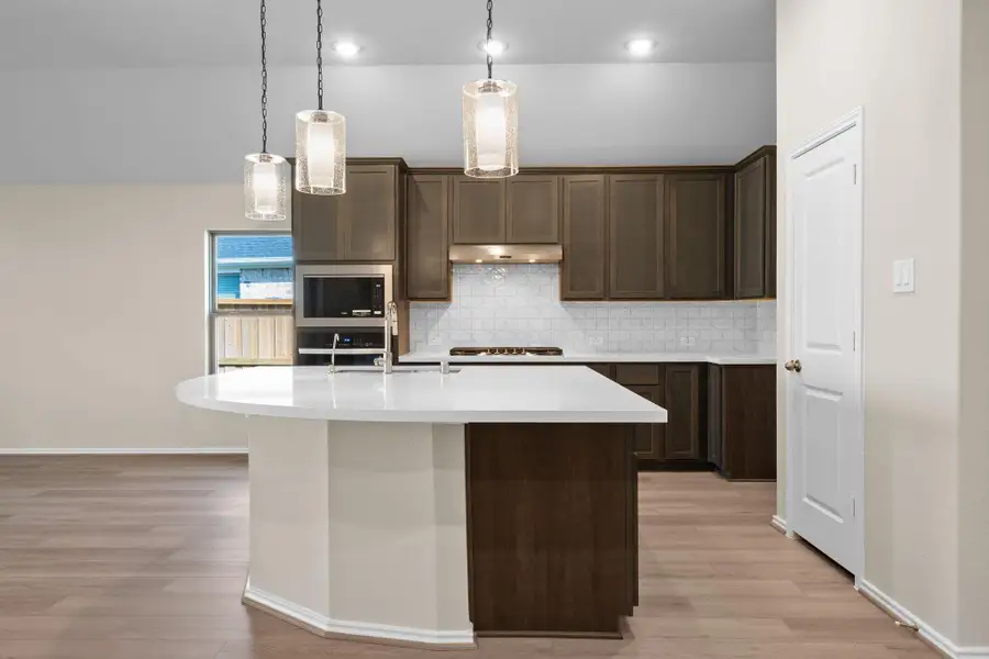 Furnished interior view inside a new home in Dunham Pointe 50', Cypress (Image 8).