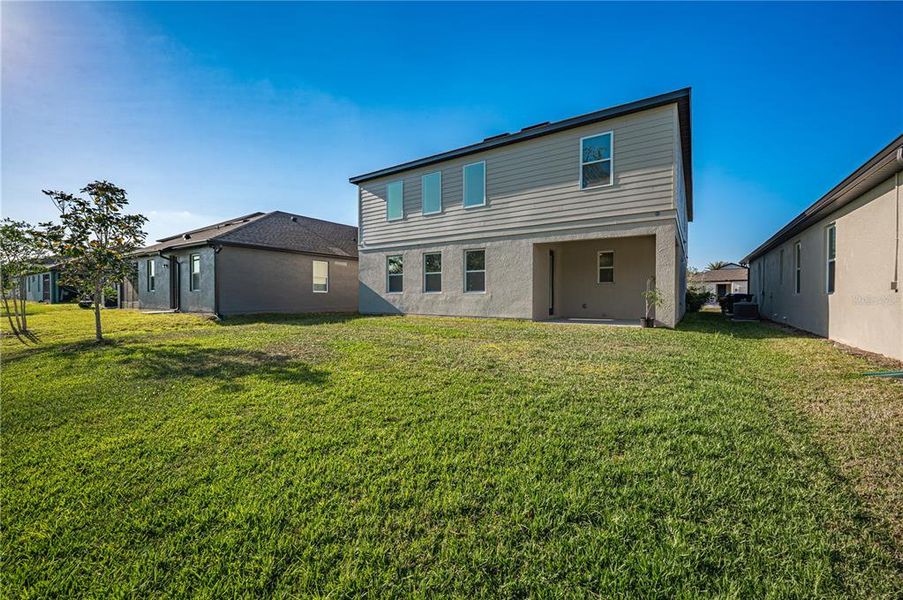 Front exterior of a new home in , Orlando, FL, highlighting curb appeal (Image 2). Front exterior of a new home in , Orlando, FL, highlighting curb appeal (Image 2).