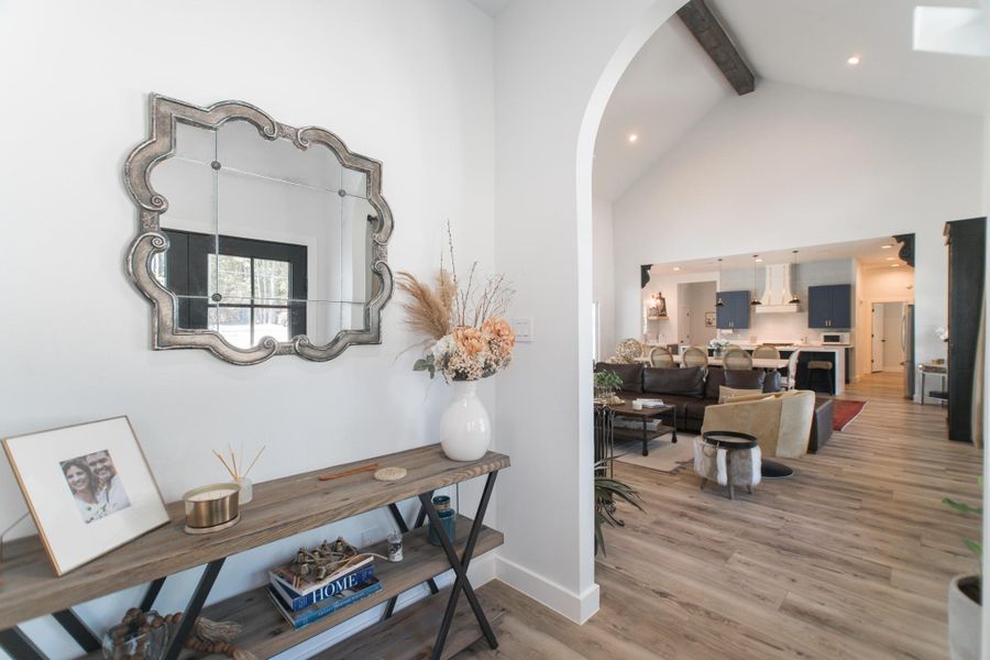 Stepping through the front door, you'll be welcomed by beautiful floors and interiors filled with natural light. Stepping through the front door, you'll be welcomed by beautiful floors and interiors filled with natural light.