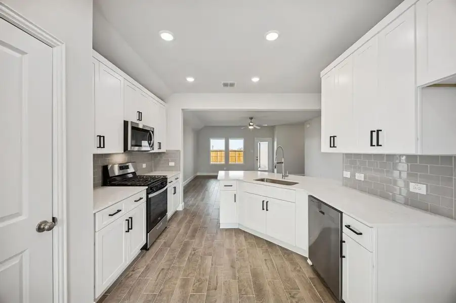 Furnished interior view inside a new home in Venetian, Weston (Image 4).