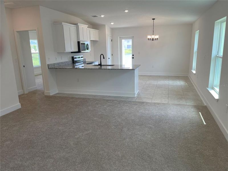 Spacious, unfurnished interior of a new home in Harmony Central, St. Cloud (Image 21).