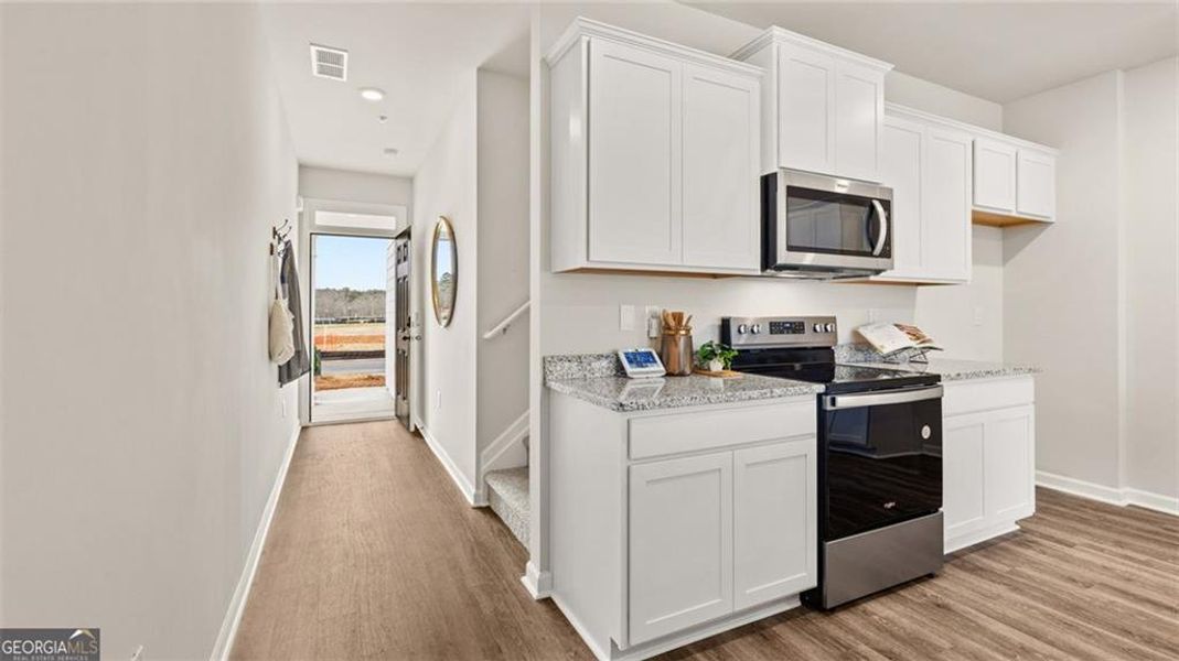 Furnished interior view inside a new home in Echo Glen, Stockbridge (Image 11).