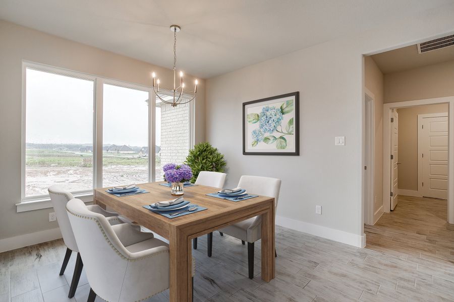 Representative furnished interior of a home built from the The Daisy by Kenmark Homes in Stagecoach Crossing, Bridgeport (Image 6).