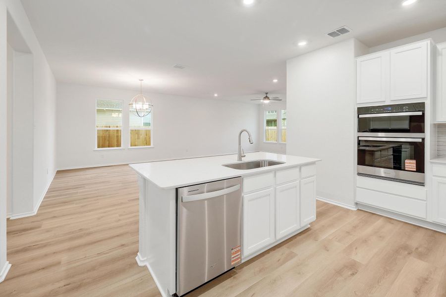 Furnished interior view inside a new home in River Bluff, Leander (Image 9). Furnished interior view inside a new home in River Bluff, Leander (Image 9).