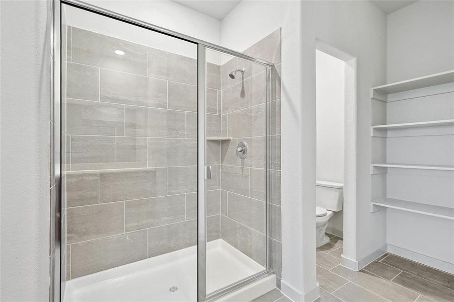 Bathroom with walk in shower and toilet