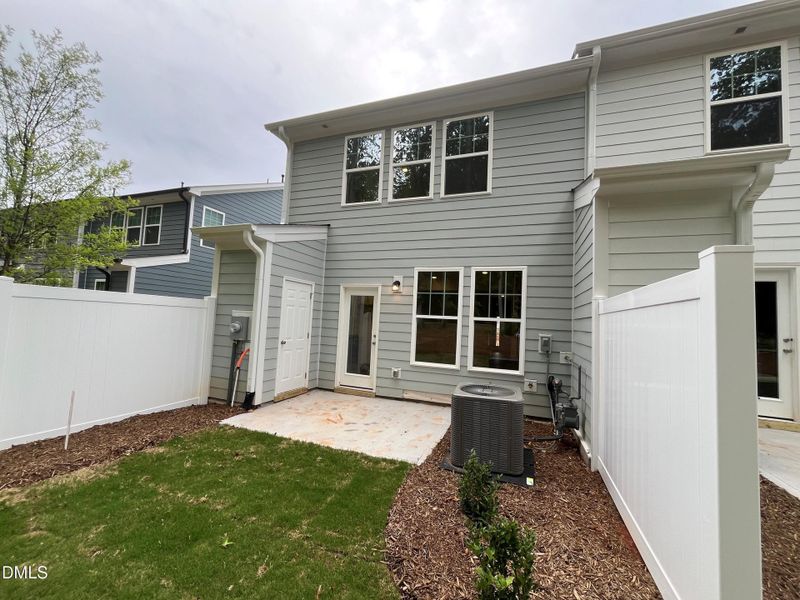 Private patio with storage shed