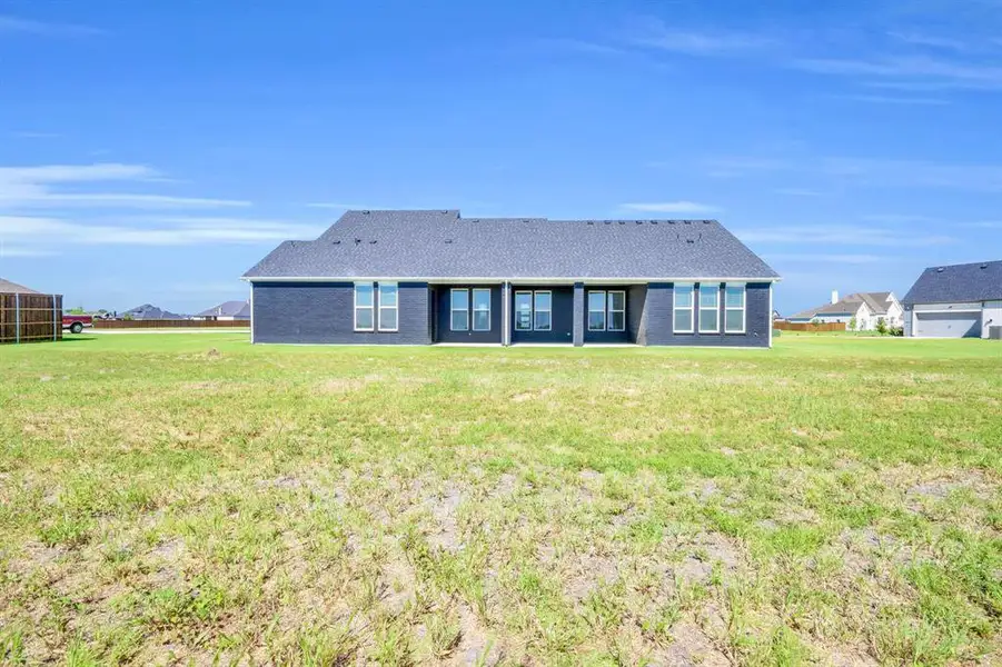 Exterior details and patio area of a home in Springside Estates II, Waxahachie (Image 3). Exterior details and patio area of a home in Springside Estates II, Waxahachie (Image 3).