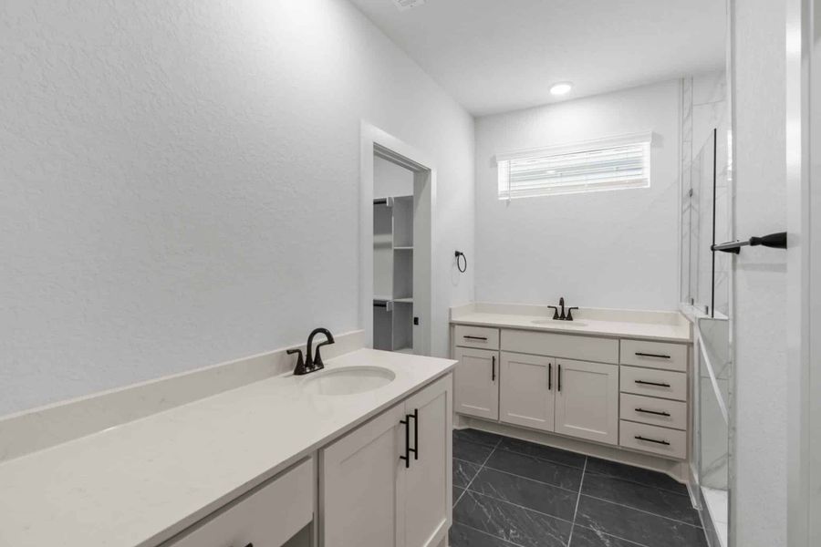 Representative furnished interior of a home built from the Balder by Chesmar Homes in Centero at Stone Oak, San Antonio (Image 6).