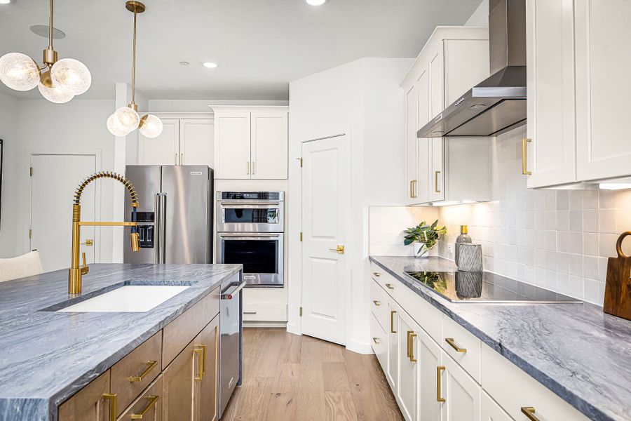 Representative furnished interior of a home built from the Asherton by Pulte Homes in Monarch on Main, Round Rock (Image 25). Representative furnished interior of a home built from the Asherton by Pulte Homes in Monarch on Main, Round Rock (Image 25).