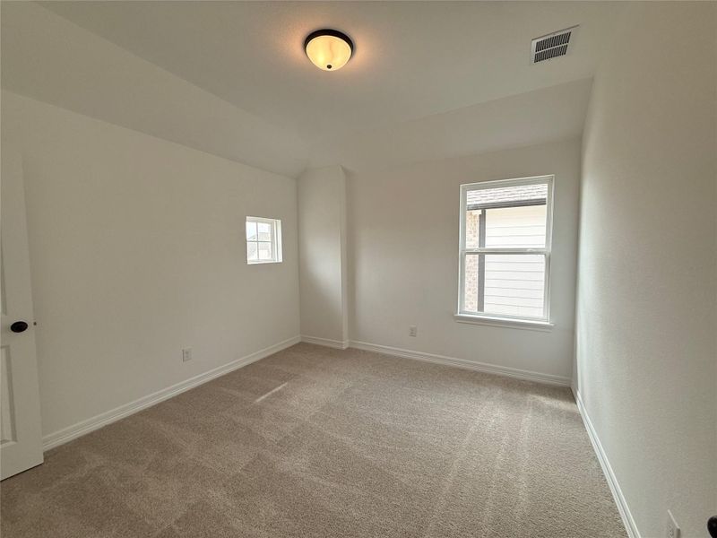 Spacious, unfurnished interior of a new home in Wildrye, Waller (Image 29).