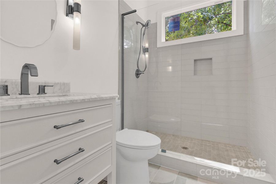 Main level full bath off bedroom Main level full bath off bedroom