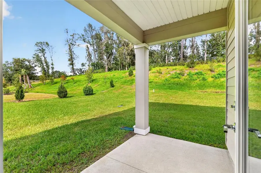 Exterior details and patio area of a home in , Alachua (Image 3).