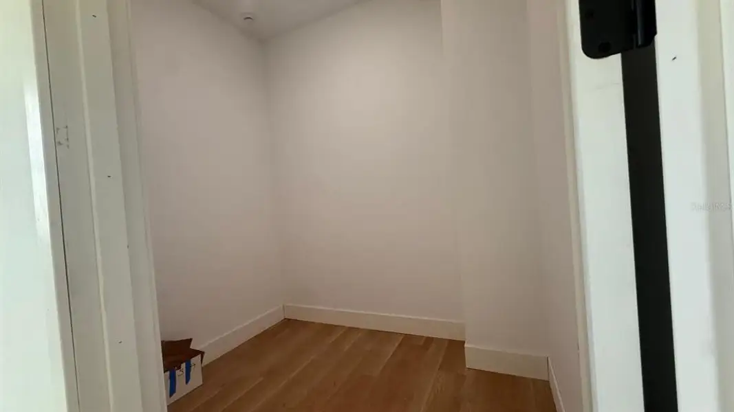 Spacious, unfurnished interior of a new home in , Port Charlotte (Image 8).
