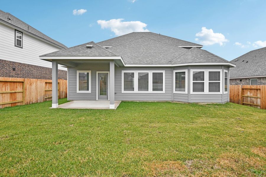 Exterior details and patio area of a home in Pine Lake Cove - Classic Series, Montgomery (Image 3).